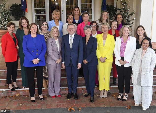 Anthony Albanese poses with the women that were sworn into his cabinet on June 1